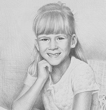 Little Girl Sitting at the Table