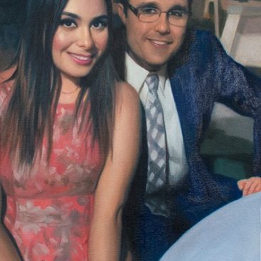 Young Couple Sitting at the Table