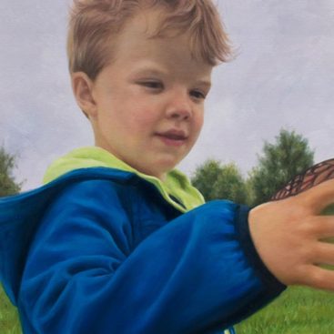 Little Boy Wearing a Blue Coat